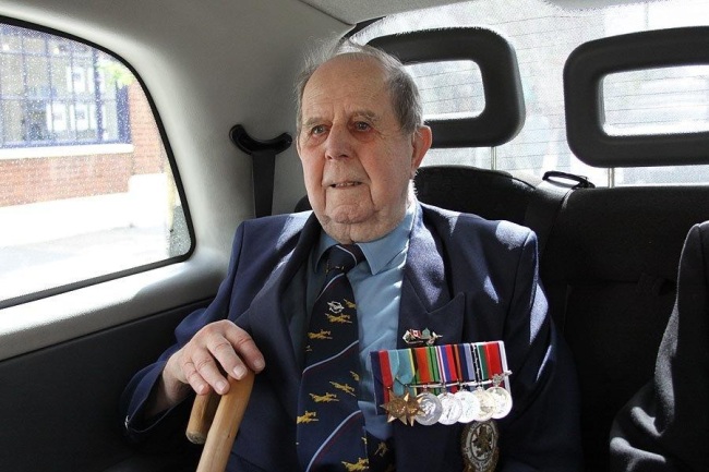 Harry in car, off to Ceremony