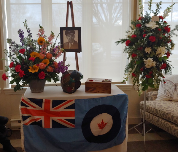 RCAF flag, Neil's helmet and the box with his ashes
