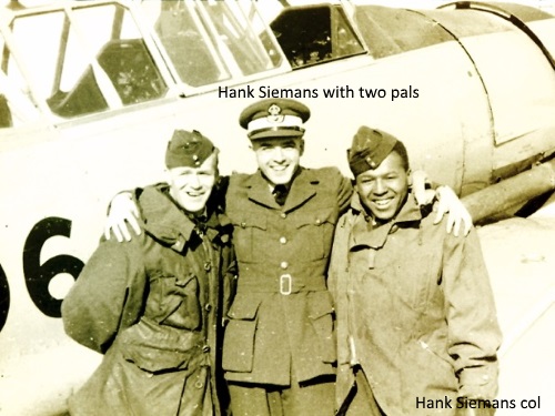 Hank and two pals in front of a Harvard